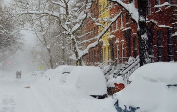 Cars Buried Under Snow on Cold Morning