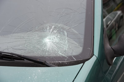 Broken Windshield to Replace with Used Auto Glass from Milwaukee Salvage Yard