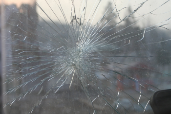 Spider web crack on car windshield